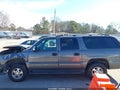 2002 Chevrolet Suburban 1500 — photo 14 of 16 | VIN 1GNEC16Z52J248502