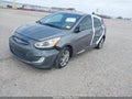 2014 Hyundai Accent — photo 2 of 16 | VIN KMHCU5AE4EU188963