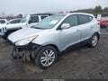 2012 Hyundai Tucson — photo 2 of 14 | VIN KM8JUCAC8CU383343