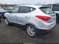 2012 Hyundai Tucson — photo 3 of 14 | VIN KM8JUCAC8CU383343