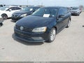 2015 Volkswagen Jetta — photo 2 of 11 | VIN 3VWD07AJ4FM310365