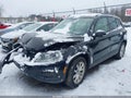2015 Volkswagen Tiguan — photo 2 of 15 | VIN WVGBV7AX8FW516848