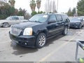 2012 GMC Yukon XL — photo 2 of 17 | VIN 1GKS2MEF9CR147994