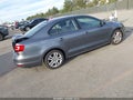 2015 Volkswagen Jetta — photo 4 of 13 | VIN 3VW2K7AJ4FM213040