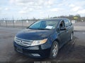 2012 Honda Odyssey — photo 2 of 16 | VIN 5FNRL5H90CB004358