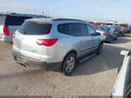 2010 Chevrolet Traverse — photo 4 of 12 | VIN 1GNLREED0AS126822