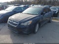2014 Subaru Impreza — photo 2 of 11 | VIN JF1GJAC64EH017142