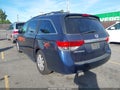 2014 Honda Odyssey — photo 3 of 17 | VIN 5FNRL5H61EB044635