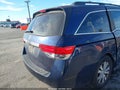 2014 Honda Odyssey — photo 4 of 17 | VIN 5FNRL5H61EB044635
