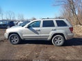 2007 Jeep Grand Cherokee — photo 14 of 16 | VIN 1J8HR582X7C640911