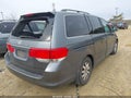 2010 Honda Odyssey — photo 4 of 11 | VIN 5FNRL3H71AB111614
