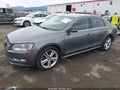 2014 Volkswagen Passat — photo 2 of 18 | VIN 1VWCN7A3XEC018279
