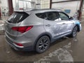 2018 Hyundai Santa Fe — photo 4 of 18 | VIN 5XYZUDLA5JG549440