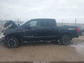 2018 Nissan Titan — photo 14 of 16 | VIN 1N6AA1E51JN551809