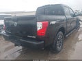 2018 Nissan Titan — photo 4 of 16 | VIN 1N6AA1E51JN551809