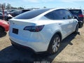 2023 Tesla Model Y — photo 4 of 16 | VIN 7SAYGDEE7PA126961