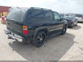 2004 Chevrolet Tahoe — photo 4 of 12 | VIN 1GNEC13Z04R253535