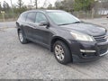 2014 Chevrolet Traverse — photo 1 of 12 | VIN 1GNKRHKDXEJ298031
