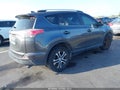 2016 Toyota RAV4 — photo 4 of 16 | VIN JTMZFREV6GJ084540