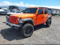 2018 Jeep Wrangler Unlimited — photo 2 of 16 | VIN 1C4HJXDG4JW256298