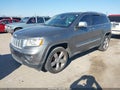 2012 Jeep Grand Cherokee — photo 2 of 13 | VIN 1C4RJECT7CC222996