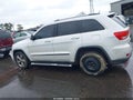 2013 Jeep Grand Cherokee — photo 14 of 16 | VIN 1C4RJEBT3DC511568