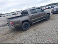 2011 Toyota Tacoma — photo 4 of 16 | VIN 3TMJU4GN2BM113692