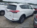 2016 Toyota RAV4 Hybrid — photo 4 of 18 | VIN JTMRJREV1GD053984