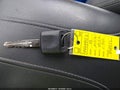 2009 Nissan Versa — photo 11 of 15 | VIN 3N1BC11E89L449932