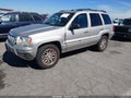 2004 Jeep Grand Cherokee — photo 2 of 11 | VIN 1J4GX58N04C221801
