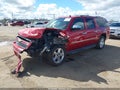 2013 Chevrolet Suburban 1500 — photo 2 of 16 | VIN 1GNSKKE7XDR287165