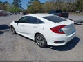 2018 Honda Civic — photo 3 of 21 | VIN 19XFC2F52JE025653