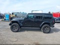 2019 Jeep Wrangler Unlimited — photo 13 of 15 | VIN 1C4HJXFG9KW631214