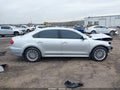 2016 Volkswagen Passat — photo 13 of 16 | VIN 1VWBT7A36GC068682