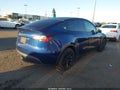 2022 Tesla Model Y — photo 4 of 12 | VIN 7SAYGDEE1NF310308