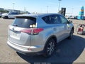 2018 Toyota RAV4 — photo 4 of 20 | VIN JTMZFREV7JJ192219