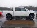 2011 Nissan Titan — photo 13 of 17 | VIN 1N6AA0EC8BN308864