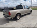 2002 Ford F-150 — photo 4 of 11 | VIN 1FTRX17W22NB42147