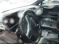 2016 Tesla Model S — photo 7 of 17 | VIN 5YJSA1E26GF174009