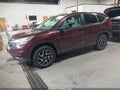 2016 Honda CR-V — photo 2 of 16 | VIN 2HKRM3H42GH506575