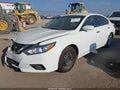 2016 Nissan Altima — photo 2 of 15 | VIN 1N4AL3AP3GN322630