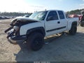 2004 Chevrolet Silverado 1500 — photo 2 of 17 | VIN 1GCEK19T34E139972
