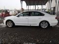 2017 Volkswagen Passat — photo 14 of 16 | VIN 1VWGT7A32HC051353