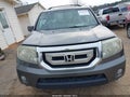 2011 Honda Pilot — photo 12 of 17 | VIN 5FNYF3H98BB021222