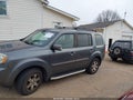 2011 Honda Pilot — photo 14 of 17 | VIN 5FNYF3H98BB021222