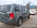 2011 Honda Pilot — photo 4 of 17 | VIN 5FNYF3H98BB021222