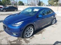 2020 Tesla Model Y — photo 2 of 15 | VIN 5YJYGDEF1LF005667