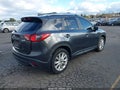 2014 Mazda CX-5 — photo 4 of 16 | VIN JM3KE4DY2E0301756