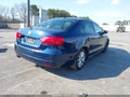 2011 Volkswagen Jetta — photo 4 of 13 | VIN 3VWDX7AJ4BM021282