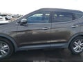 2013 Hyundai Santa Fe — photo 14 of 16 | VIN 5XYZU3LA0DG117837